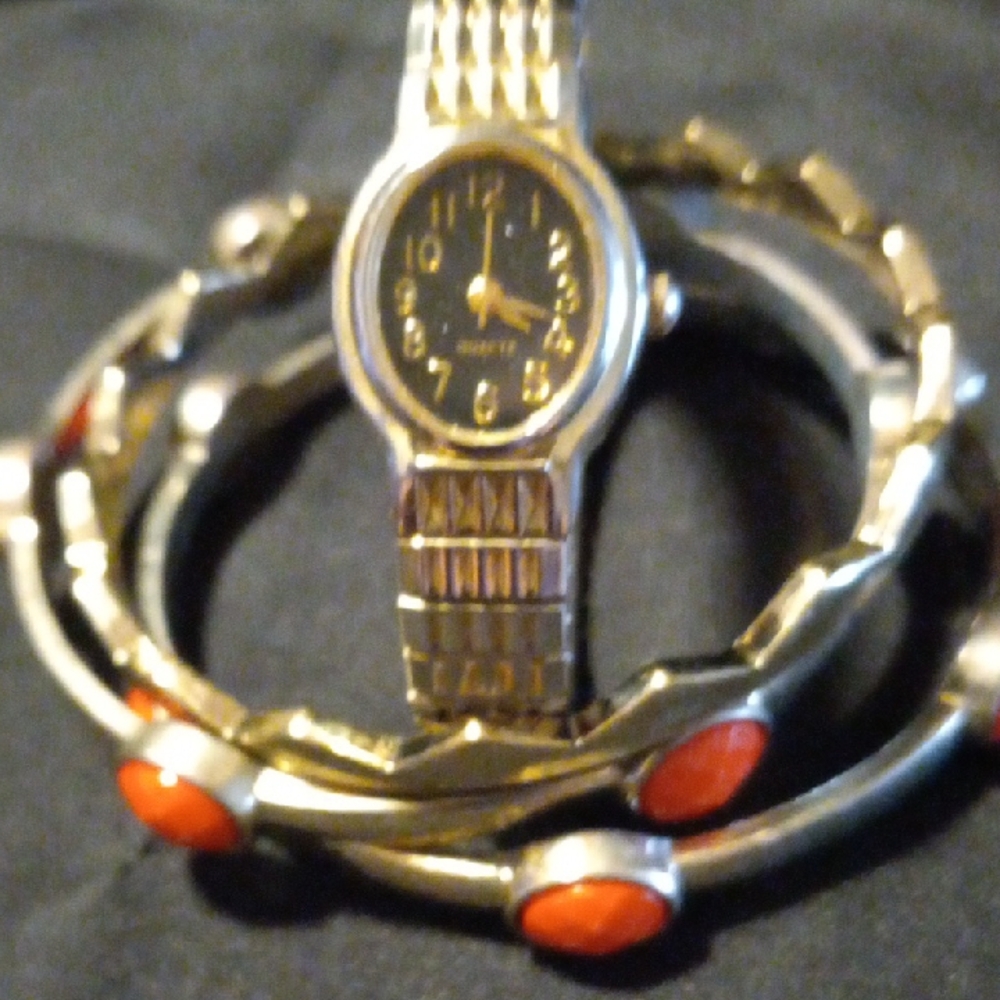 Gold Tone Watch with Red and gold tone Accent Bangle bracelets